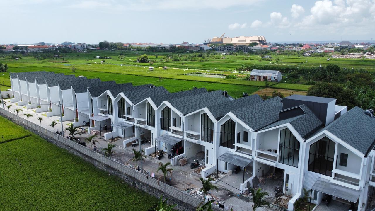 a Reuben sandwich on wax paper. 